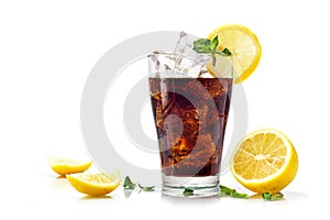 Glass of cola or coke with ice cubes, slices of lemon and pepper