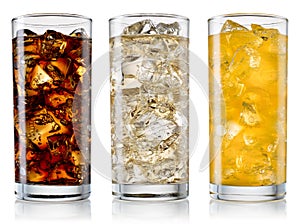 Glass of cola, fanta, sprite with ice cubes isolated on white. W
