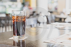 a glass of cola in restaurant