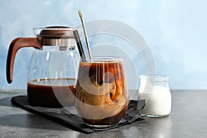 Glass with cold brew coffee and milk