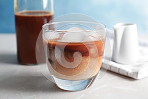 Glass with cold brew coffee and milk