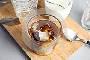 Glass with cold brew coffee and milk