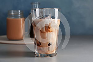 Glass with cold brew coffee and milk
