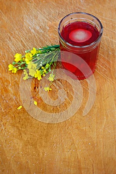 Glass of compote on wooden table