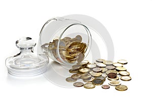 Glass container with coins, figurative retirement savings