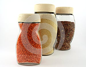 Glass containers with lentils and breadcrumb photo