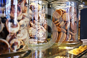 Glass cookie jars in a coffee shop and bakery