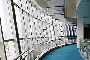 Glass corridor in office centre