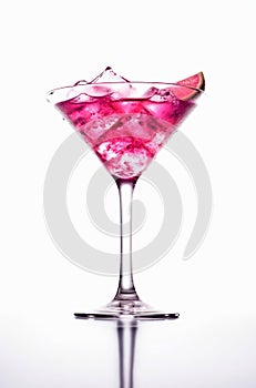 Glass of cosmopolitan cocktail on white background.