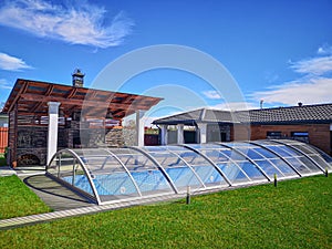 Glass covered pool with water indoor swimming pool