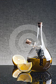 Glass cruet with olive oil photo