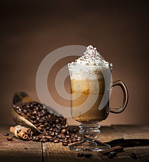 Glass cup with coffee beans