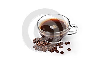 Glass cup of espresso coffee and coffee beans isolated on white background