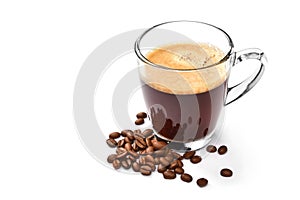 Glass cup of espresso coffee and coffee beans isolated on white background