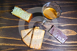 Glass cup of Expresso with a different sweets