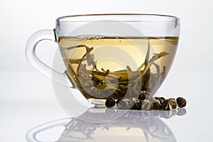 Glass cup of fresh white tea