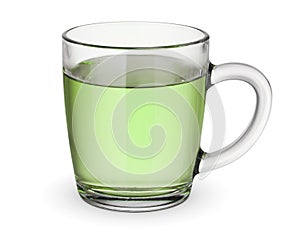 Glass cup of hot green tea isolated on white
