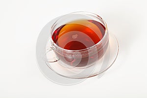 Glass cup of hot tea