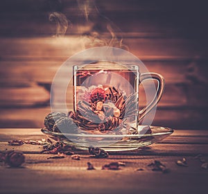 Glass cup with tea flower