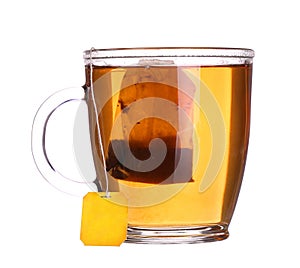 Glass cup of tea with lemon and mint isolated on white