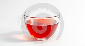 Glass cup with tea on a white background isolated.