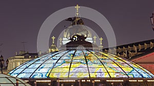 Glass cupola crowned by a statue of Saint George, patron of Moscow, at the Manege Square timelapse in Moscow, Russia