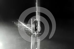 worker cuts glass with a glass cutter