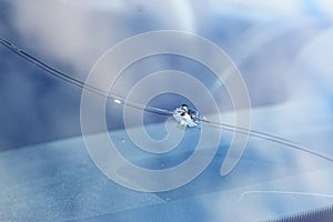 Glass damage from stone chips in the windscreen