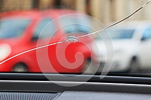 Glass damage from stone chips in the windscreen photo