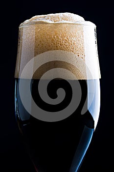 Glass of dark beer