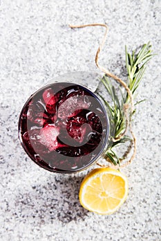 Glass with dark currant or cherry drink