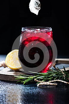 Glass with dark currant or cherry drink