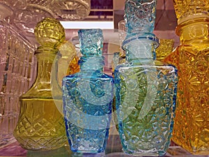 Glass decanters on a store shelf.