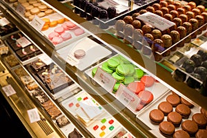 Glass Display Case of Candies and Baked Goods