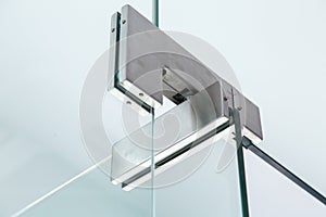 Glass door hinges gray color.