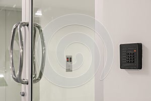 Glass door with keypad photo