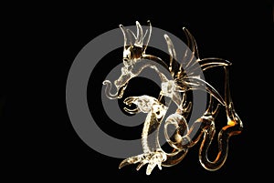 Glass dragon illuminated