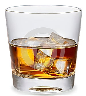 Whiskey in glass with ice - close-up view on transparent background. photo