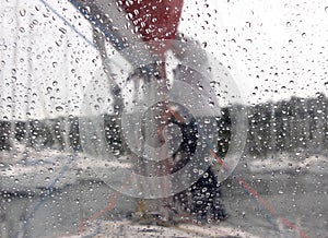 Through glass with drops of water
