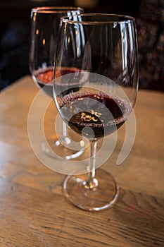 Glass of dry French merlot red wine from Bordeaux, France photo