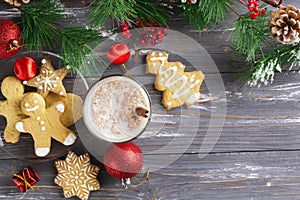 Glass of eggnog on wooden background