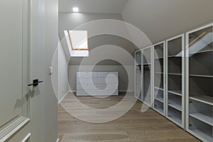 Glass Elegance: Large White Wardrobe in Modern Closet Design