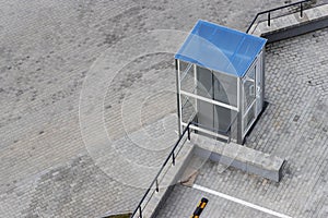 Glass elevator for disabled and disabled people at the entrance to a modern building. Caring for people