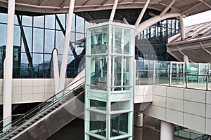 Glass elevator and escalator