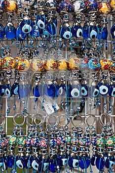 The glass evil eye keychains for sale in the souvenir shop