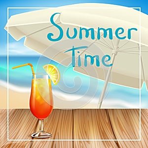 A glass with an exotic cocktail on a background of a sea landscape, a drink `Sex on the beach`, on the seashore. Beach umbrella,