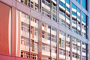 Glass facade of modern office building , window reflection