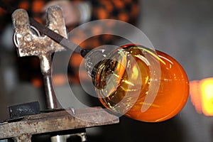 Glass factory, glassworks, glass blower