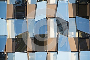 Glass faÐ“Â§ade in hi-tech style. Modern building with irregular geometry