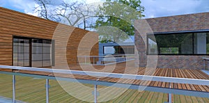 Glass fence of a wooden terrace of a recently commissioned country house. Exits to the outside from different rooms. Panoramic